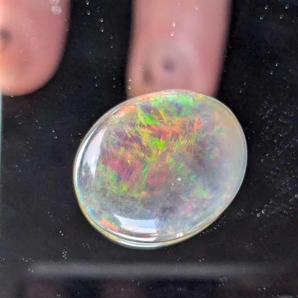 5.85ct Natural play of color black opal - Picture 16 of 16